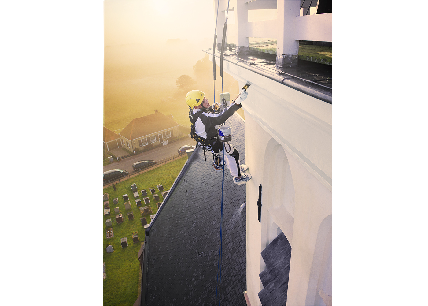 Pro gold painter church abseiling morning light sun painting