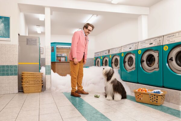 man and dog in landry