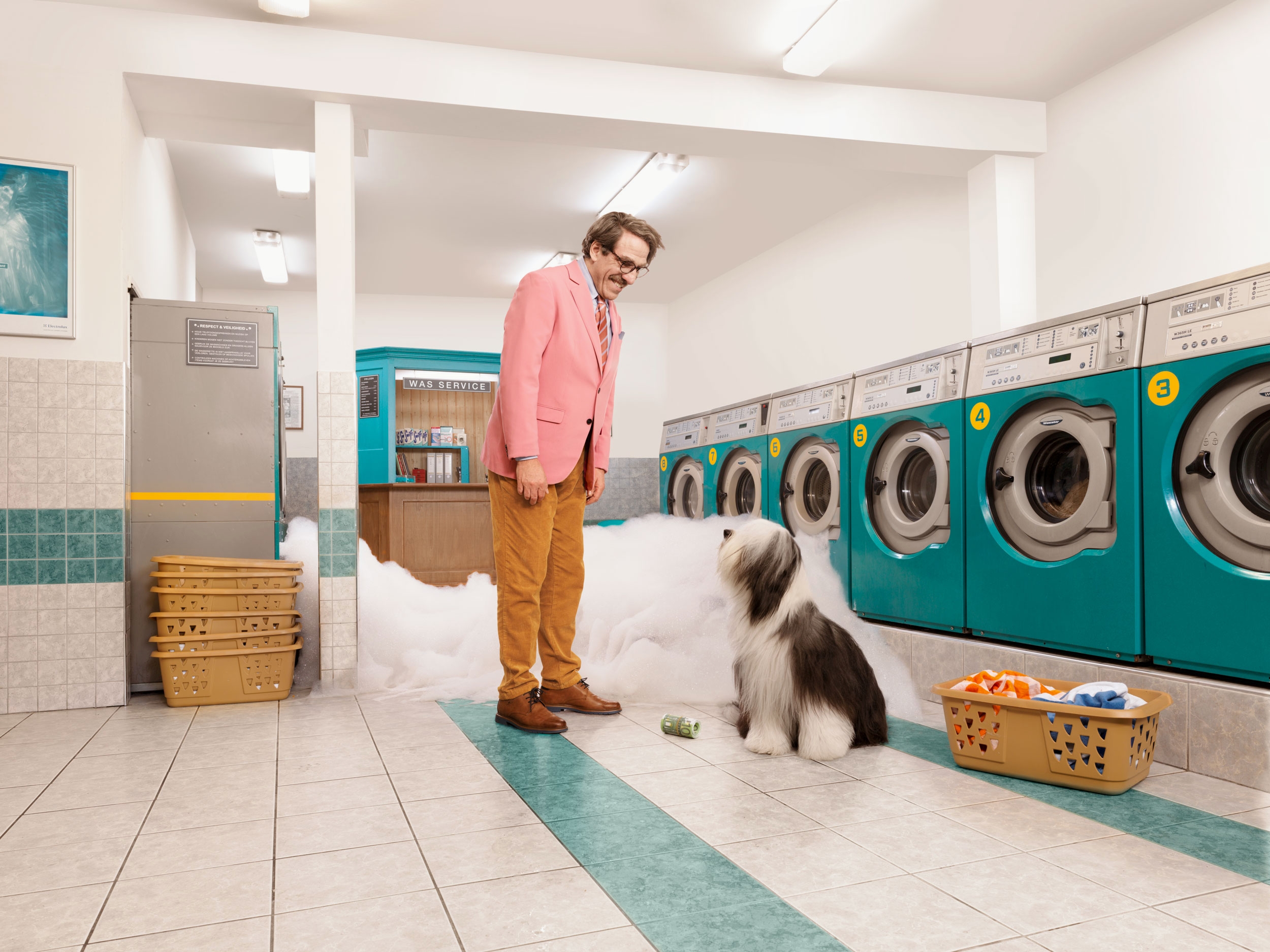 man and dog in landry