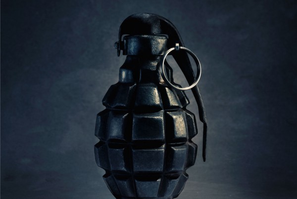 Hand; grenade; dark; background; black; safety; pin; insurance; amsterdam; the netherlands