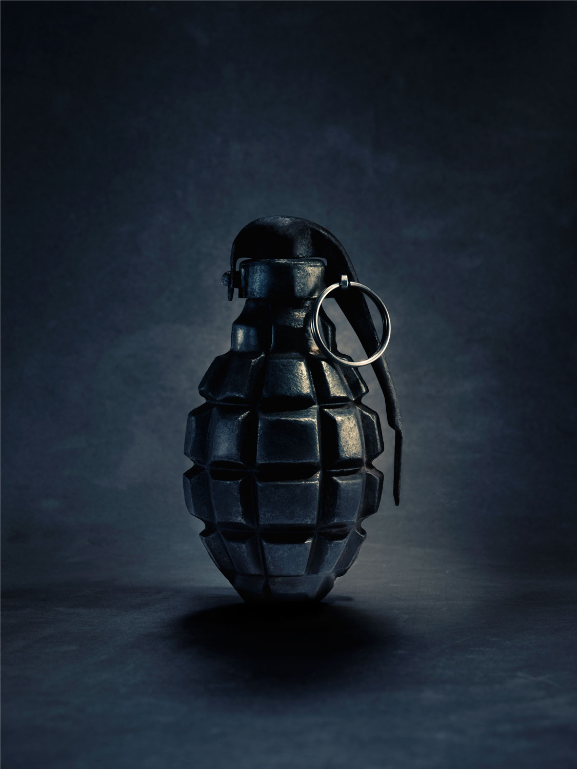 Hand; grenade; dark; background; black; safety; pin; insurance; amsterdam; the netherlands